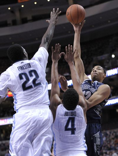 Georgetown’s Otto Porter Jr. shoots over Villanova defenders. (Associated Press)