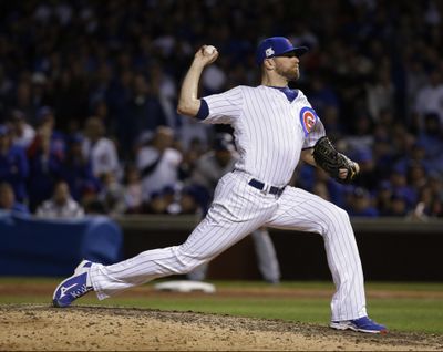 The Colorado Rockies added a significant piece to what is becoming a formidable, high-priced bullpen, agreeing to a three-year, $52 million contract on Friday with All-Star reliever Wade Davis, formerly of the Chicago Cubs. (Nam Y. Huh / Associated Press)
