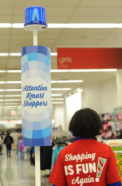 IMAGE DISTRIBUTED FOR KMART - The iconic Bluelight Special fixture flashes to announce a Bluelight Special taking place in a New York City store on Saturday, Nov. 7, 2015. Kmart Bluelight Specials are back every single day, in every single store plus online and via mobile app. Bluelight Specials are the original flash sale, first introduced in 1965. (Diane Bondareff / AP Images for Kmart) ORG XMIT: CPANY455 (Diane Bondareff / Ap Images)