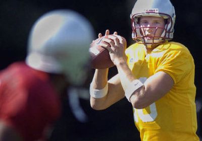 
Alex Brink, looking downfield at last week's Washington State scrimmage, is the Cougar staff's choice as No. 1 quarterback this season after impressing at camp.
 (Christopher Anderson/ / The Spokesman-Review)