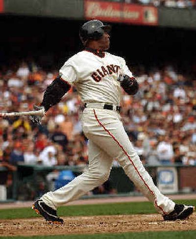 BARRY BONDS TAKES IT HOME