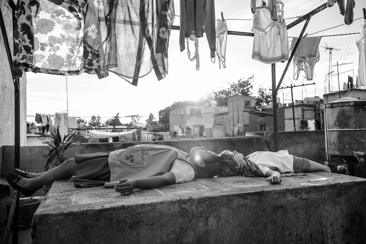 Yalitza Aparicio, left, with Marco Graf in “Roma.” (Carlos Somonte / Netflix)