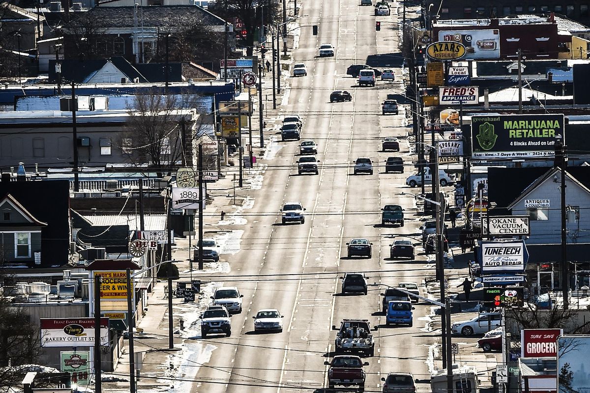 Construction work this year  will reconfigure traffic from four lanes to two lanes on a 1.1-mile stretch of North Monroe Street from Indiana Avenue to Kieman Avenue. (Colin Mulvany / The Spokesman-Review)
