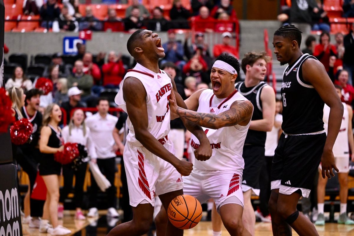 Eastern Washington’s Cedric Coward, left, and LeJuan Watts celebrate during a win over Idaho State on Thursday at Reese Court in Cheney.  (Courtesy of EWU Athletics)