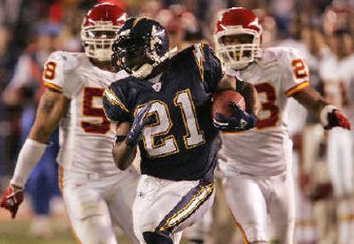 
Chargers' LaDainian Tomlinson bolts for an 85-yard TD. 
 (Associated Press / The Spokesman-Review)