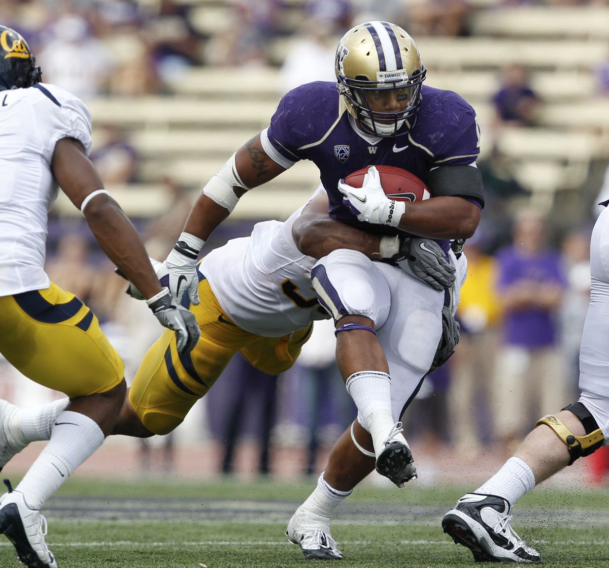 Washington’s Chris Polk entered the weekend with 872 rushing yards, well ahead of the field in the Pac-12. (Associated Press)