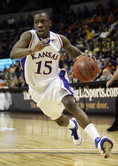 Associated Press Kansas star Tyshawn Taylor was injured during a scuffle. (Associated Press / The Spokesman-Review)