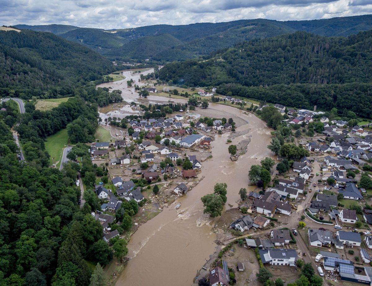 The Ahr river floats past destroyed houses in Insul, Germany, Thursday, July 15, 2021. Due to heavy rain falls the Ahr river dramatically went over the banks the evening before.  (Michael Probst)