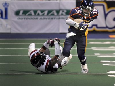 Shock receiver Raul Vijil shakes off the defense of Oklahoma City’s Tito Jose during Friday night’s game at the Arena. (CHRISTOPHER ANDERSON photos / The Spokesman-Review)