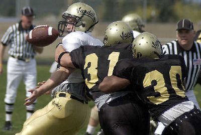 
Josh Bousman (31) has played himself into a starting role at outside linebacker. 
 (File/ / The Spokesman-Review)
