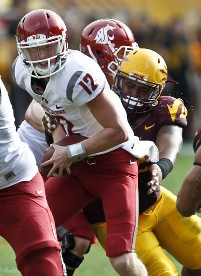 The Cougars need QB Connor Halliday to limit his interceptions. (Associated Press)