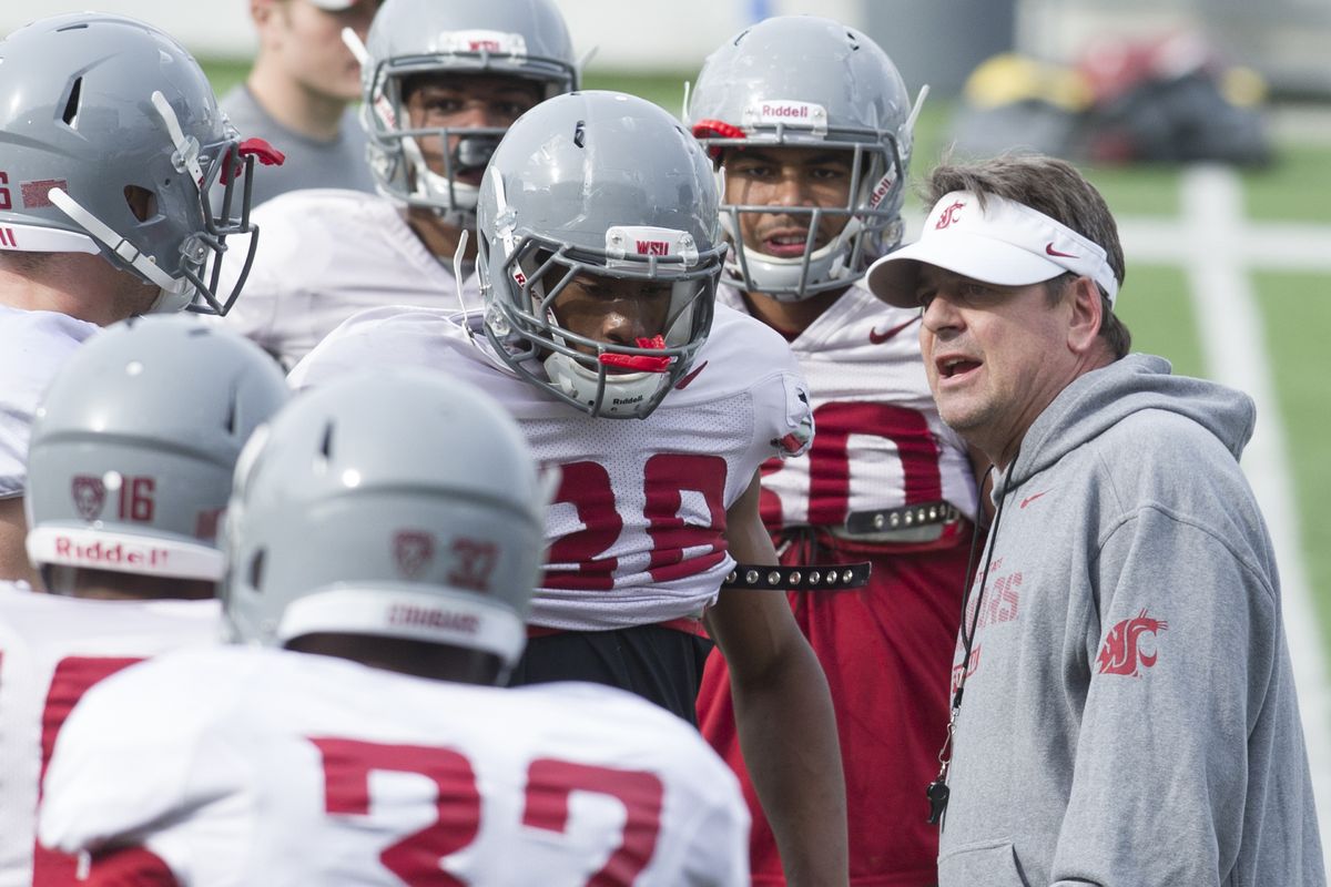 Defensive coordinator Mike Breske was fired after the Cougars finished 10th in the Pac-12 in both scoring defense and total defense. (File photos by TYLER TJOMSLAND)