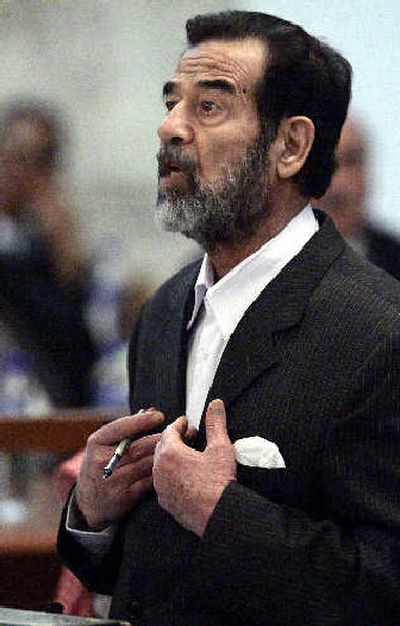 Former Iraqi President Saddam Hussein speaks at his trial.
(Associated Press / The Spokesman-Review)