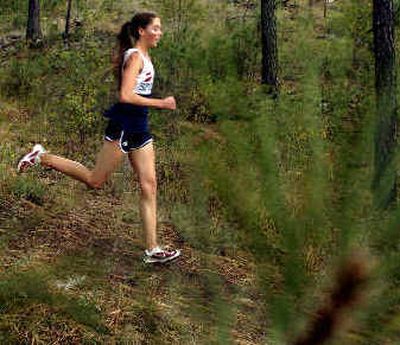 
Mt. Spokane's Megan O'Reilly races to victory. 
 (Jed Conklin / The Spokesman-Review)