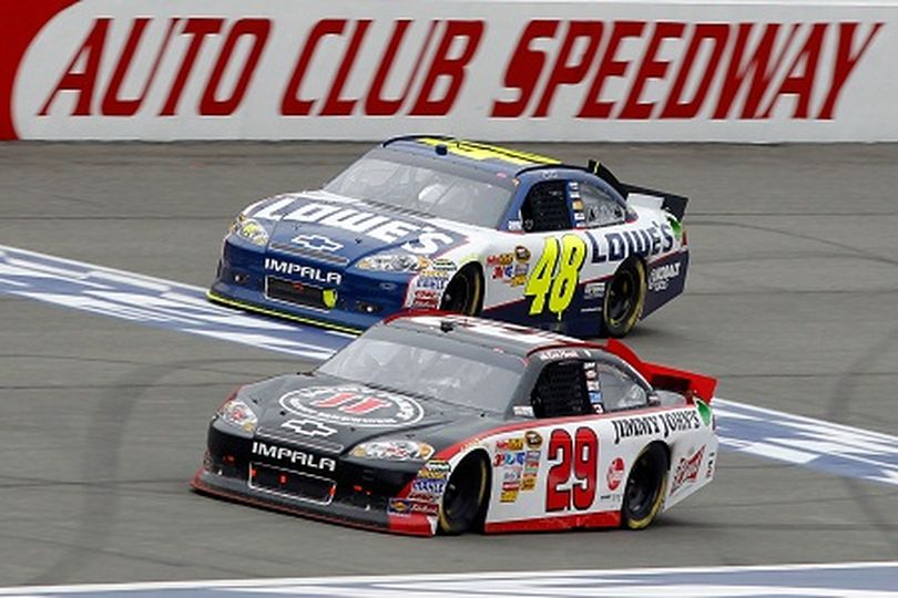 Kevin Harvick crosses the finish line 0.14 seconds ahead of Jimmie Johnson to win the Auto Club 400, his first win at Auto Club Speedway. (Photo Credit: Todd Warshaw/Getty Images for NASCAR) (Todd Warshaw / Getty Images North America)