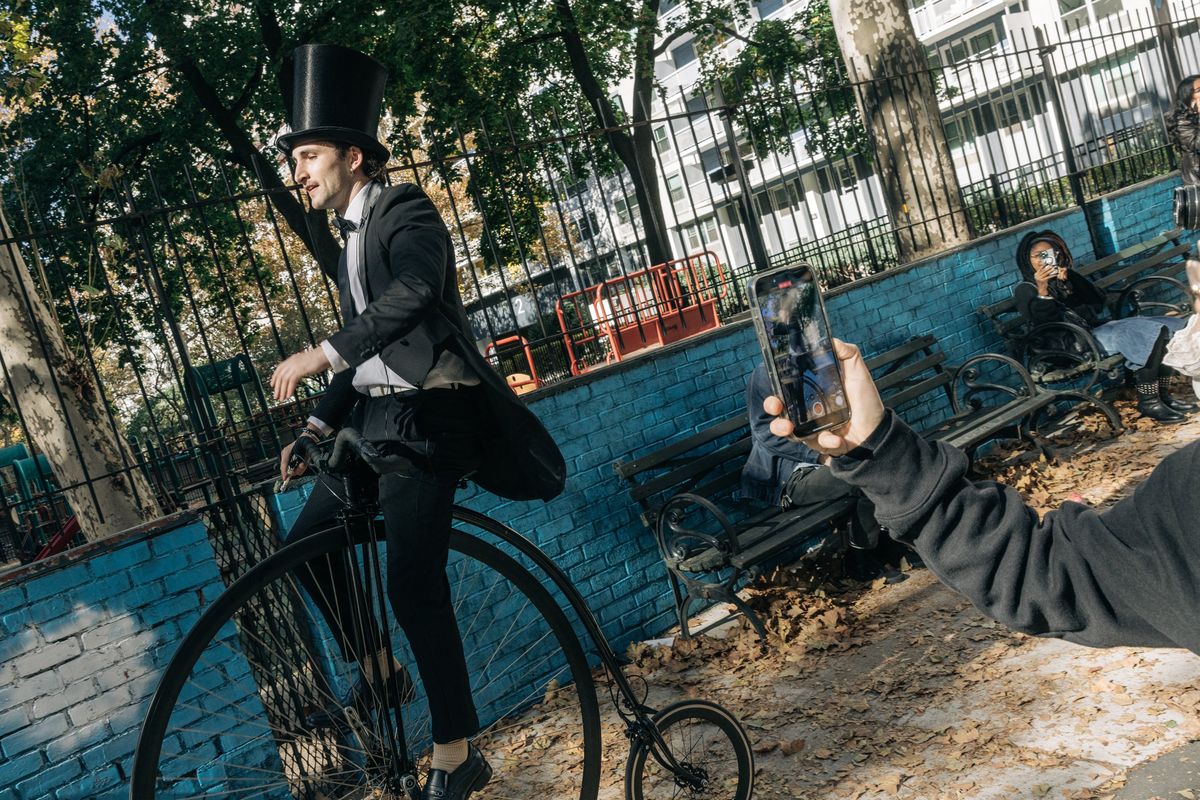 MANHATTAN, NY - Oactorber 27 : Anthony Po ride a penny farthing during a Timothee Chalamet lookalike contest in New York on Oct 27, 2024. (Photo by Jeenah Moon for The Washington Post)  (Jeenah Moon)