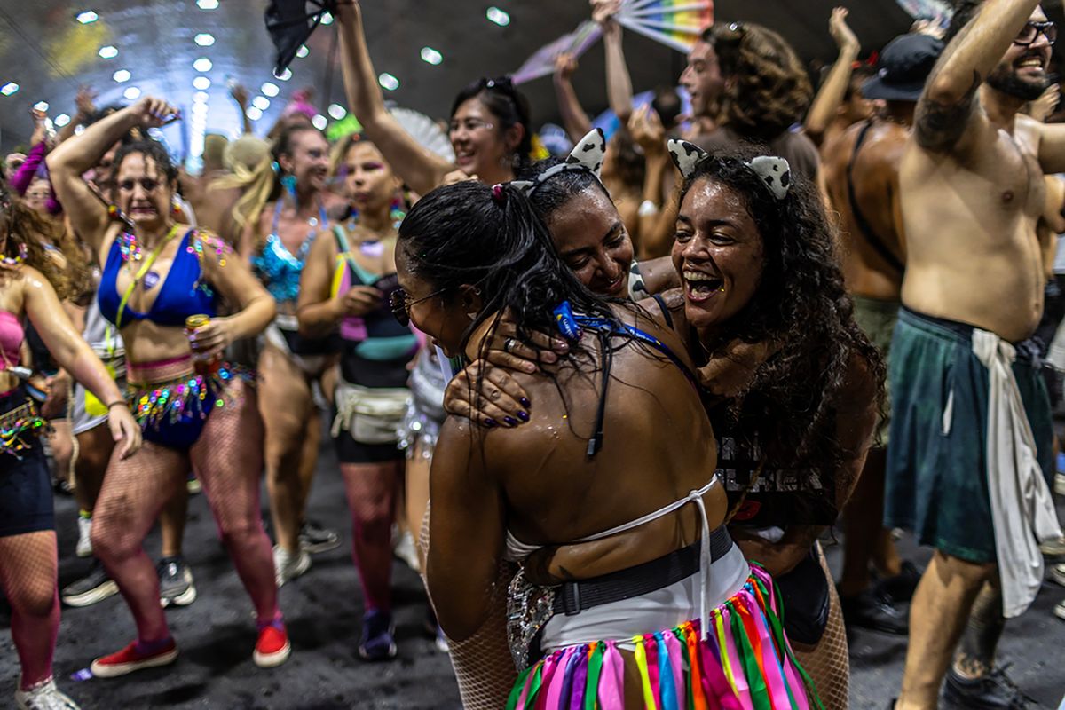 Revelers take part on Sunday in the Boi Tolo in Rio de Janeiro. The Boi Tolo, one of the city’s most iconic street parties, has come to represent the glittery, gritty grass-roots celebration far from the glamour of the official parades. (DADO GALDIERI)