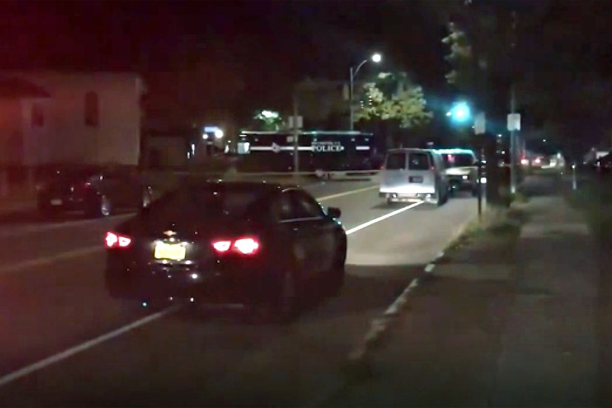 Police respond to the scene of a shooting early Saturday, Sept. 19, 2020 in Rochester, N.Y. As many as 100 people were at a backyard party when the shooting started just before 12:30 a.m., Acting Police Chief Mark Simmons told reporters.  (TEL)