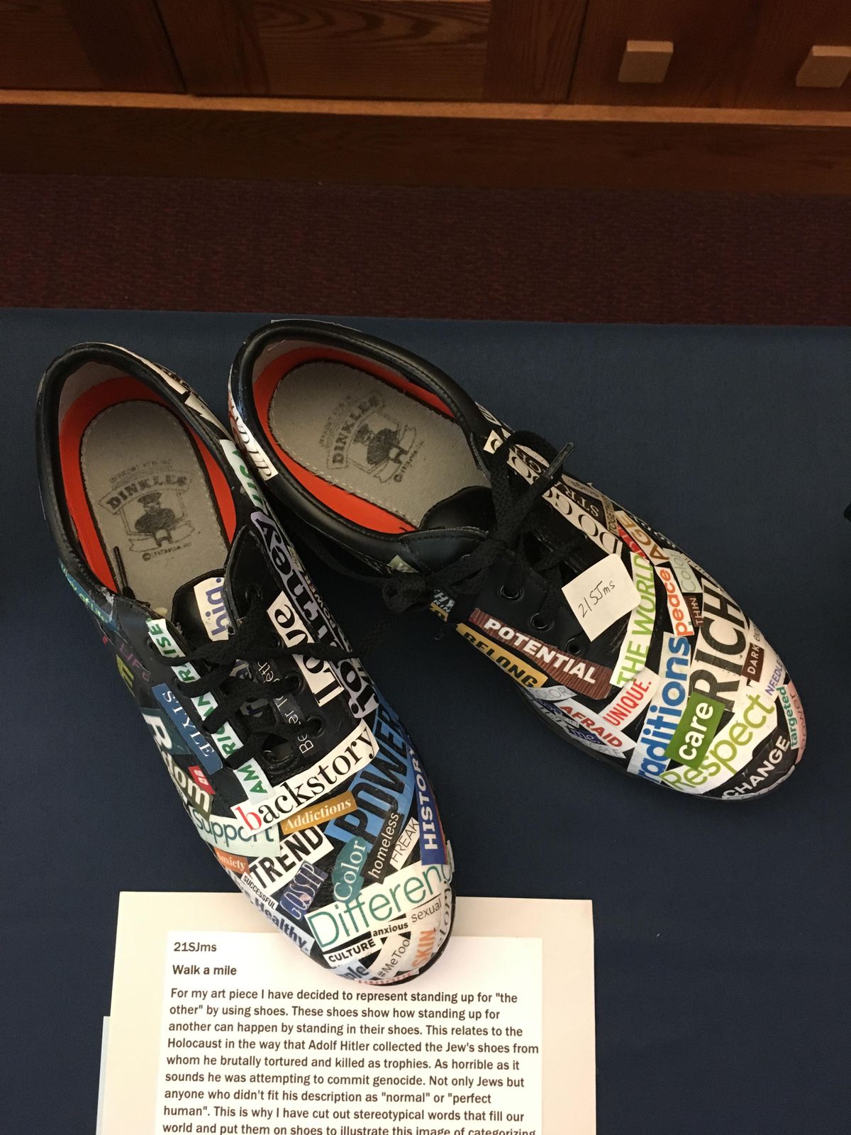 “Walk a Mile,” by Sydney Johnston, depicts what one might experience and learn by walking in another’s shoes. It is the winner in the 2019 Eva Lassman Memorial art contest for the middle school division. (Courtesy photo)