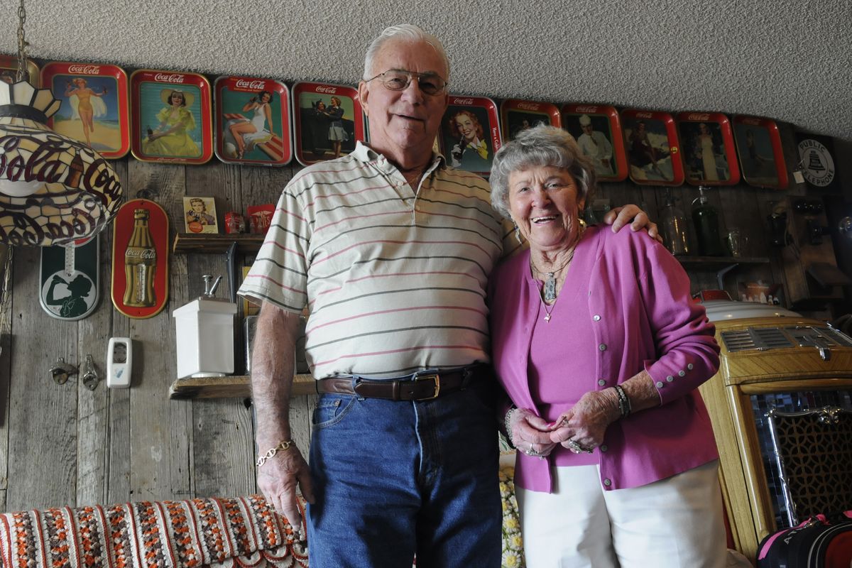 Howard Dolphin and his wife Mary Floy in the basement of their Liberty Lake home in 2010. (File)