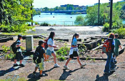
Rathdrum, Idaho, fifth-graders on a field trip walk past the Boeing amphitheater in Riverfront Park last Thursday.
 (Holly Pickett / The Spokesman-Review)