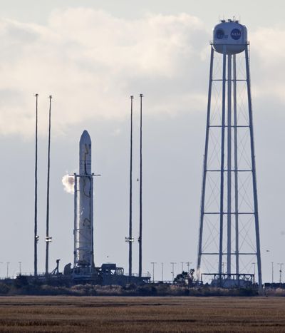 Orbital ATK's Antares rocket sits on the 0A launch pad moments before a scheduled launch at the NASA Wallops Island flight facility in Wallops Island, Va., Saturday, Nov. 11, 2017. (Steve Helber / Associated Press)