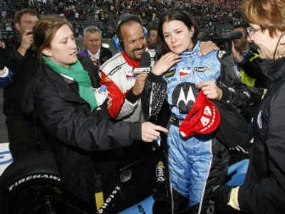 
Danica Patrick receives congratulations Sunday after winning the Indy Japan 300. Associated Press
 (Associated Press / The Spokesman-Review)