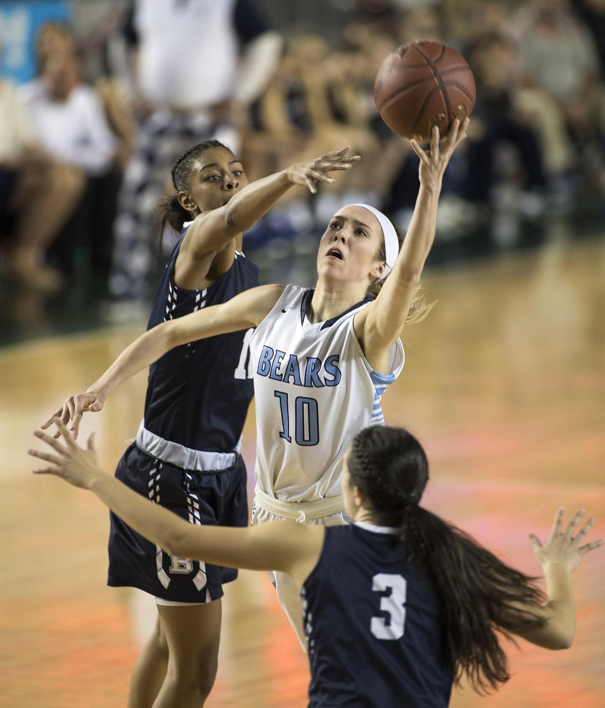 Central Valley’s Lexie Hull, middle, attempts a shot between the defense of Bellarmine Prep’s Shalyse Smith, left, and Madeline Garcia, right, Thursday, March 2, 2017, during the quarterfinals of the 4A Girls State Basketball Tournament in Tacoma. Central Valley lost the game 56-55. (Patrick Hagerty / For The Spokesman-Review)