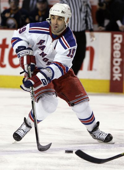 Rangers’ star center Scott Gomez is now headed to Montreal as part of a six-player trade. (Associated Press / The Spokesman-Review)