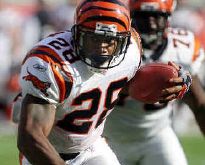 
Former Washington Huskies and Bengals running back Corey Dillon adds his considerable talents to a team, the Patriots, that is already loaded. 
 (Associated Press / The Spokesman-Review)