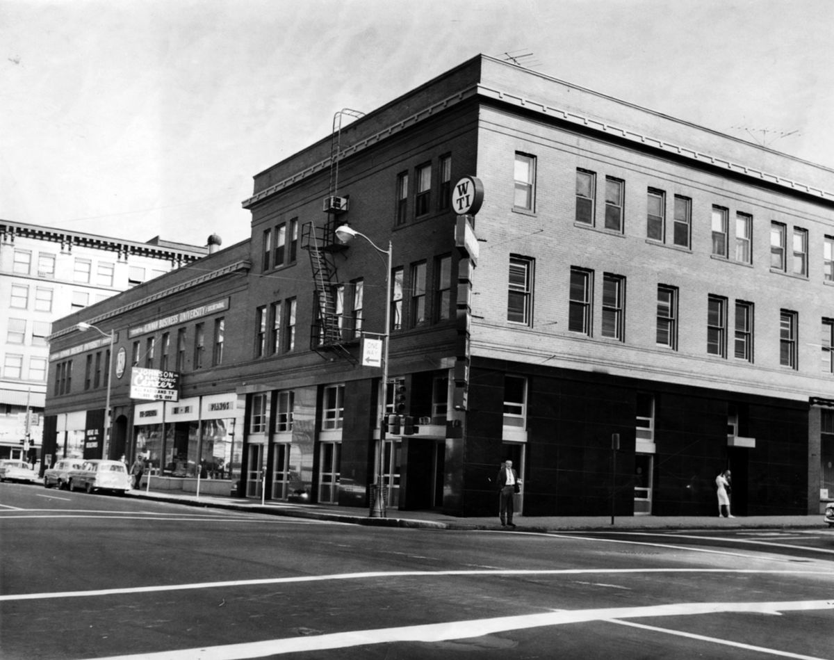 1965: Built in 1916 as the Merriam Block between Wall and Howard streets, the block-long building was bought and renamed by William Kroll in 1921.