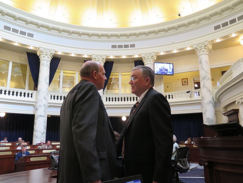 House Majority Leader Mike Moyle, left, and Speaker Scott Bedke, right, confer before the House came back into session on Tuesday morning, then recessed until 3:30 in the afternoon. (The Spokesman-Review / Betsy Z. Russell)