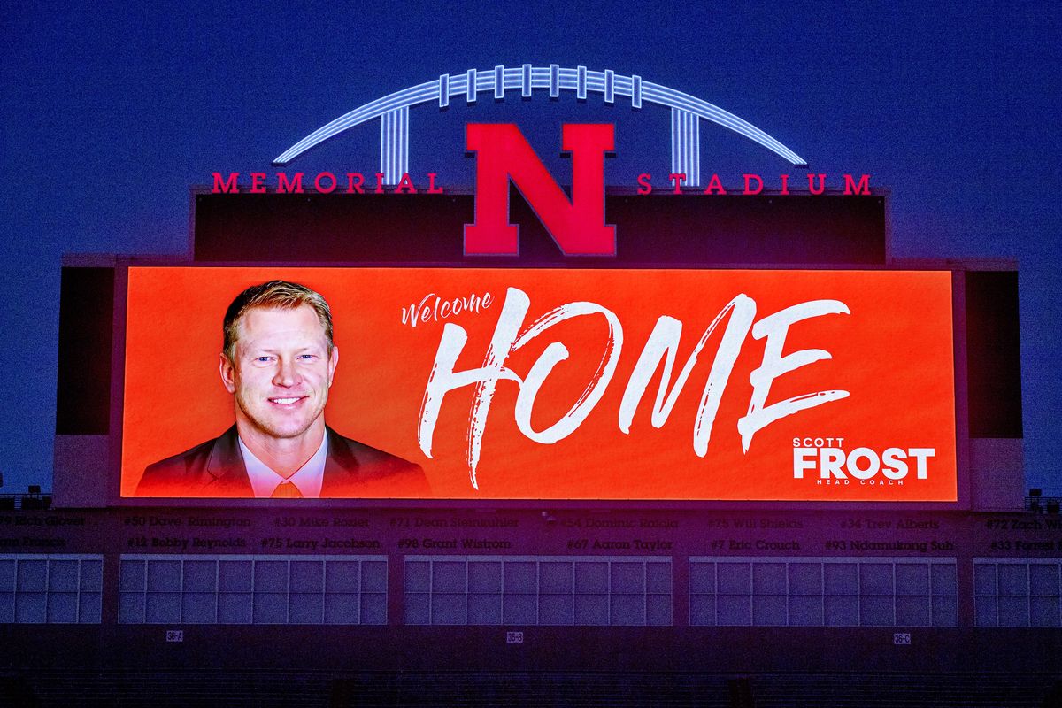 The Memorial Stadium video board displays a “Welcome Home” message to new Nebraska football coach Scott Frost on Saturday, Dec. 2, 2017, in Lincoln, Neb. Frost, the native son who quarterbacked Nebraska to a share of the national championship 20 years ago, is returning to the Cornhuskers as coach after orchestrating a stunning two-year turnaround at Central Florida. (Francis Gardler / Journal-Star via AP)