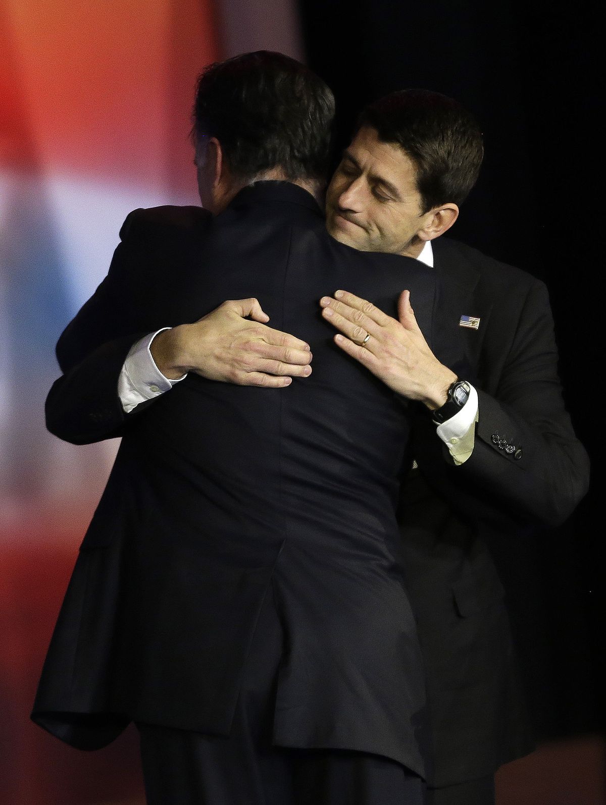 Republican presidential candidate and former Massachusetts Gov. Mitt Romney embraces Republican vice presidential candidate, Rep. Paul Ryan, R-Wis., after Romney conceded the race during his election night rally, Wednesday, Nov. 7, 2012, in Boston. (David Goldman / Associated Press)