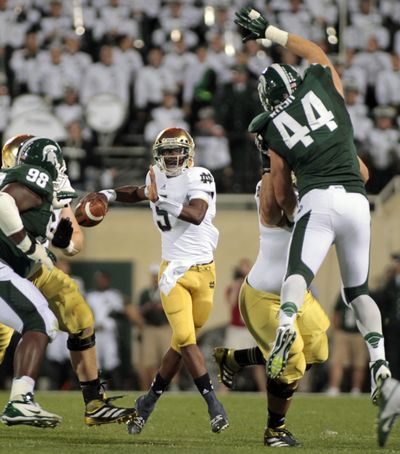 Notre Dame quarterback Everett Golson threaded Michigan State’s defense for 178 yards and one touchdown. (Associated Press)
