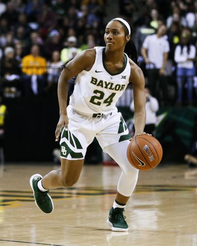 In this Jan. 3, 2019, photo, Baylor guard Chloe Jackson runs the offense during an NCAA college basketball game against Connecticut in Waco, Texas. Jackson took an unusual path to being the starting point guard for top-ranked Baylor and coach Kim Mulkey. (Ray Carlin / Associated Press)