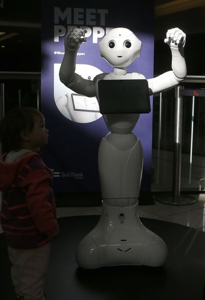 This  Dec. 22, 2016,  photo shows Pepper the robot at Westfield Mall in San Francisco. The SoftBank Robotics humanoid robot can greet shoppers and has the potential to send messages geared to peoples age and gender through facial recognition. (Jeff Chiu / AP)