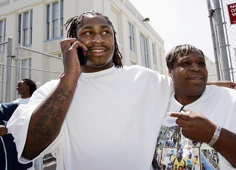 California running back Marshawn Lynch is hugged by his mother DeLisa Lynch, right, at his former high school, Oakland Technical High School, in Oakland, Calif., Saturday, April 28, 2007, after he was picked by the Buffalo Bills  as the No. 12 pick overall in the NFL football draft. (AP Photo/Paul Sakuma) ORG XMIT: CAPS108 (Paul Sakuma / The Spokesman-Review)