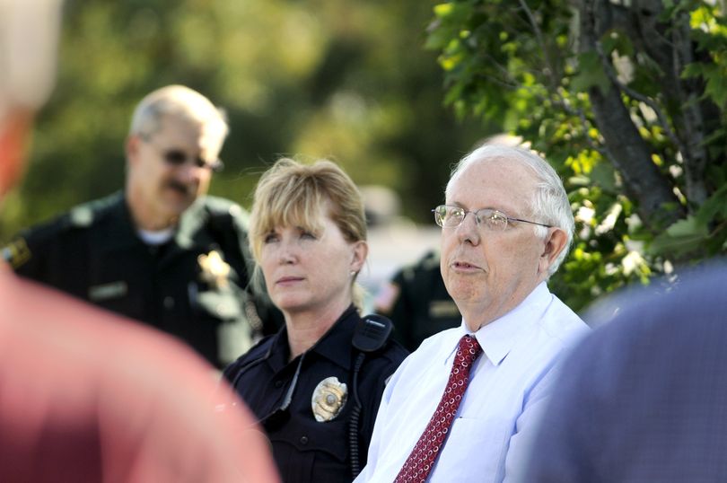 Tony Stewart, right, longtime human rights activist in Coeur d'Alene, speaks to the media alongside Sgt. Christie Wood of the Coeur d'Alene Police about racist literature and other activities at a press conference Friday, Aug. 21, 2009 near the state line. A press conference was held by law enforcement and human rights organizers to combat the recent distribution of racist flyers. JESSE TINSLEY jesset@spokesman.com (Jesse Tinsley / The Spokesman-Review)