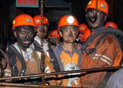 
 Rescuers prepare to go into a coal mine to search for stranded miners in Hebi City in central China's Henan Province in this 2005 file photo after a gas explosion occured earlier in the day. Thirty-four miners were killed by an earlier blast. 
 (Associated Press / The Spokesman-Review)
