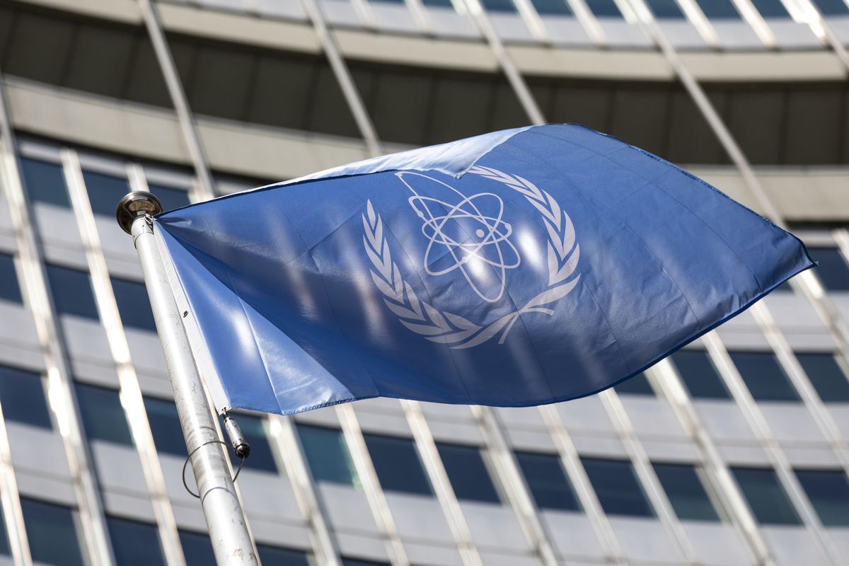 In this Monday, June 7, 2021 photo, the flag of the International Atomic Energy Agency (IAEA) waves at the entrance of the Vienna International Center in Vienna. The U.N. atomic watchdog said on Tuesday, Sept. 7 that Iran has continued to increase its stockpile of highly enriched uranium that could be used to make nuclear weapons in contravention of a 2015 accord with world powers that was meant to contain Tehran