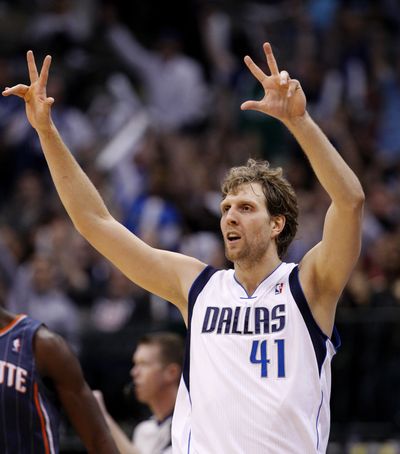 Dirk Nowitzki scored 27 points as Dallas rallied from 14 down to beat Charlotte. (Associated Press)
