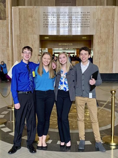 Sam Adamson, from left, Lori Riddle, Hailey Hardcastle, and Derek Evans pose at the Oregon State Capitol on Feb. 6, 2019, in Salem, Ore. The teens introduced legislation to allow students to take “mental health days” as they would sick days in an attempt to respond to a mental health crisis gripping the state. (Jessica Adamson / AP)