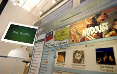 
A window display for Apple Computer Inc.'s online music store iTunes in Santa Clara, Calif. Associated Press
 (Associated Press / The Spokesman-Review)
