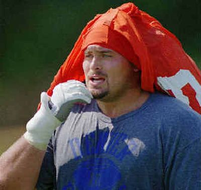 
Mark Schlereth kept his cool at the Denver Broncos' training camp in 1995. 
 (File/Associated Press / The Spokesman-Review)
