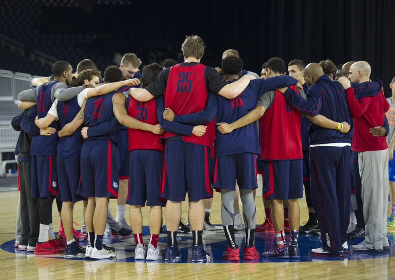 The Bulldogs huddle after their practice on Thursday at NRG Stadium in Houston. They take on the UCLA Bruins in the Sweet 16 today. (Colin Mulvany)