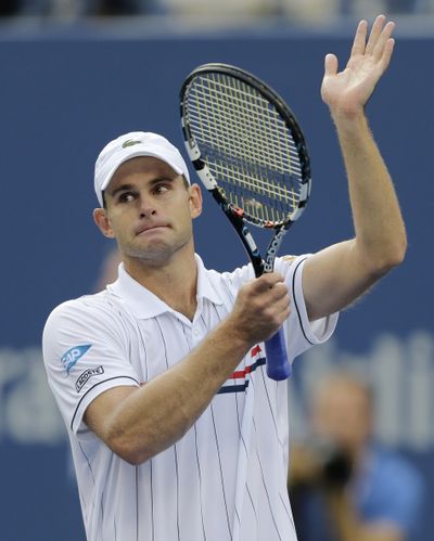 Andy Roddick salutes fans after his fourth-round loss. (Associated Press)