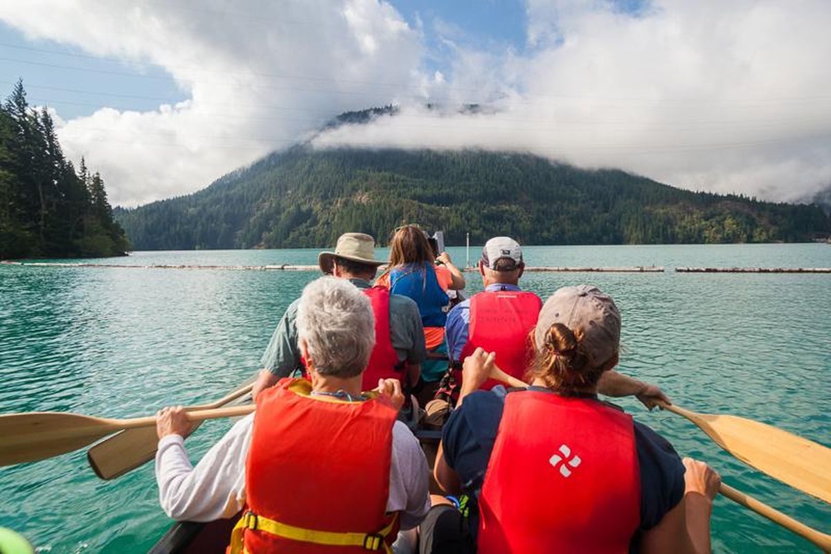 A group paddles a canoe on Diablo Lake in a course offered through the North Cascades Institute. (Ethan Welty)