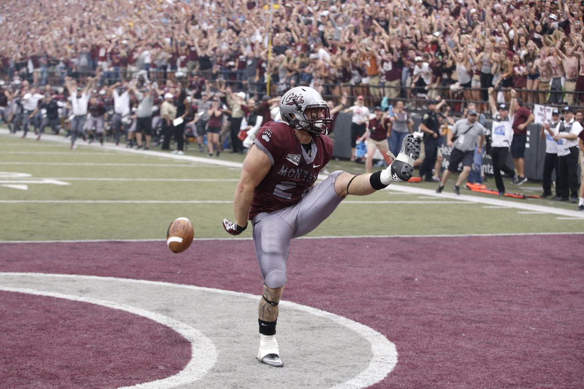 Montana running back Joey Counts celebrates after scoring the winning touchdown during the fourth quarter.  (AP)