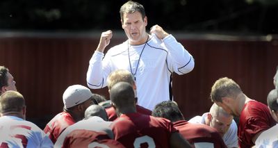 First-year Washington State University coach Paul Wulff offers his thoughts to the Cougars after the first day of fall practice.  (Christopher Anderson / The Spokesman-Review)